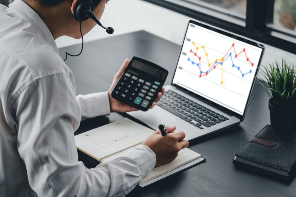 Man working on UK expat tax advice and oreign Tax Credit Relief advice for Britons abroad